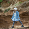 Everyone loves our woollen coats which are made from a selection of beautiful coloured wools and tailor made.  This coat is unisex so it is passed down to be treasured by the younger sisters or brothers.   Our loose fitting coat drapes around your child like a favourite blanket. Smart and warm it is a beautiful fit that you can wear open or buttoned up for a different look. 