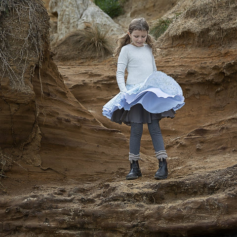 Our signature 'twirling dress'. We have been manufacturing our tutu's for 17 years for Summer and Winter.  Very comfortable for crawling or walking with the 1x1 cotton rib in cream marle fitted bodice.  With 4 full circle skirts that twirl. This style can easily be worn from 8 months old! (size 1-2)  Our Trudie tootoo dresses are easy to wear every day. And like all of our dresses easy to care for.